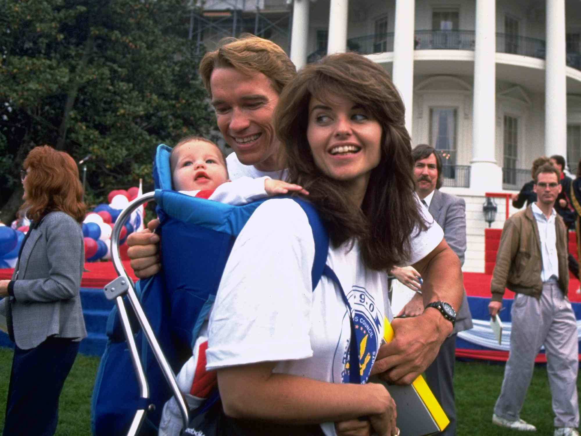 Arnold Schwarzenegger w. wife Maria Shriver & daughter Katherine Eunice on WH lawn for Great American Workout