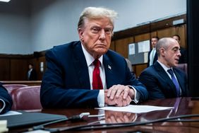 Former U.S. President Donald Trump (C) appears with his legal team Todd Blanche, and Emil Bove (R) ahead of the start of jury selection at Manhattan Criminal Court on April 15, 2024 in New York City. 