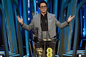 Robert Downey Jr. accepts the Supporting Actor Award for 'Oppenheimer' on stage during the EE BAFTA Film Awards 2024 at The Royal Festival Hall