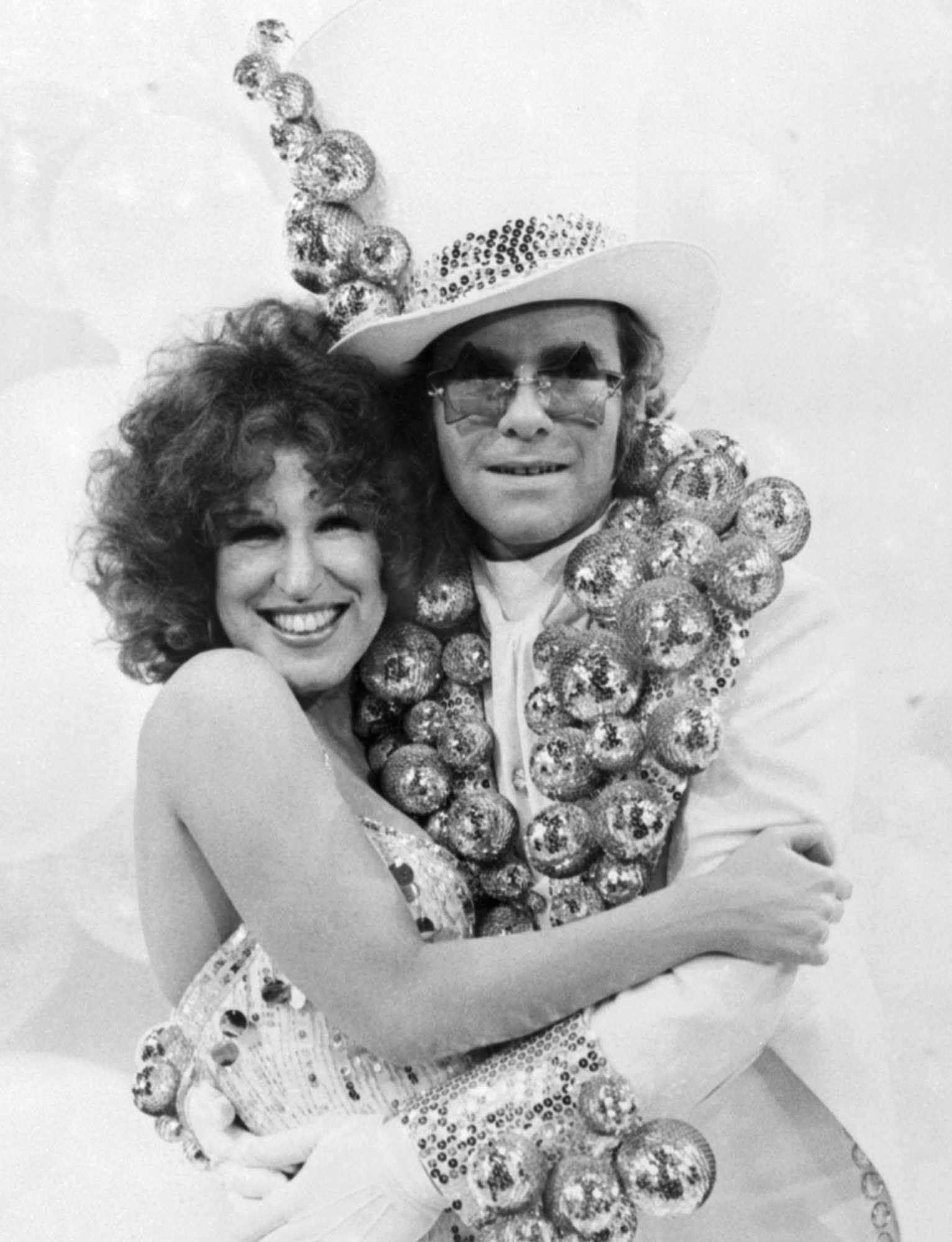 Elton John and Bette Midler Hugging