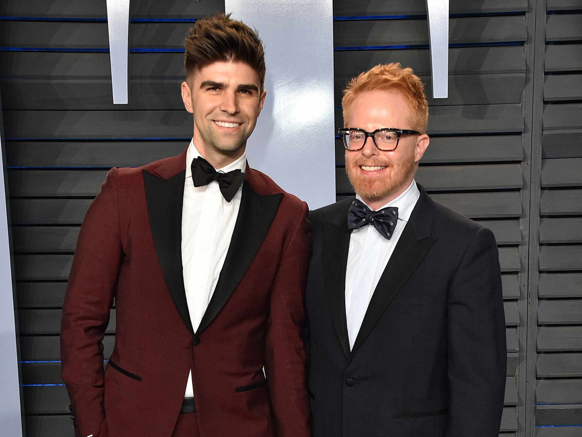Justin Mikita (L) and actor Jesse Tyler Ferguson attend the 2018 Vanity Fair Oscar Party hosted by Radhika Jones at Wallis Annenberg Center for the Performing Arts on March 4, 2018 in Beverly Hills, California