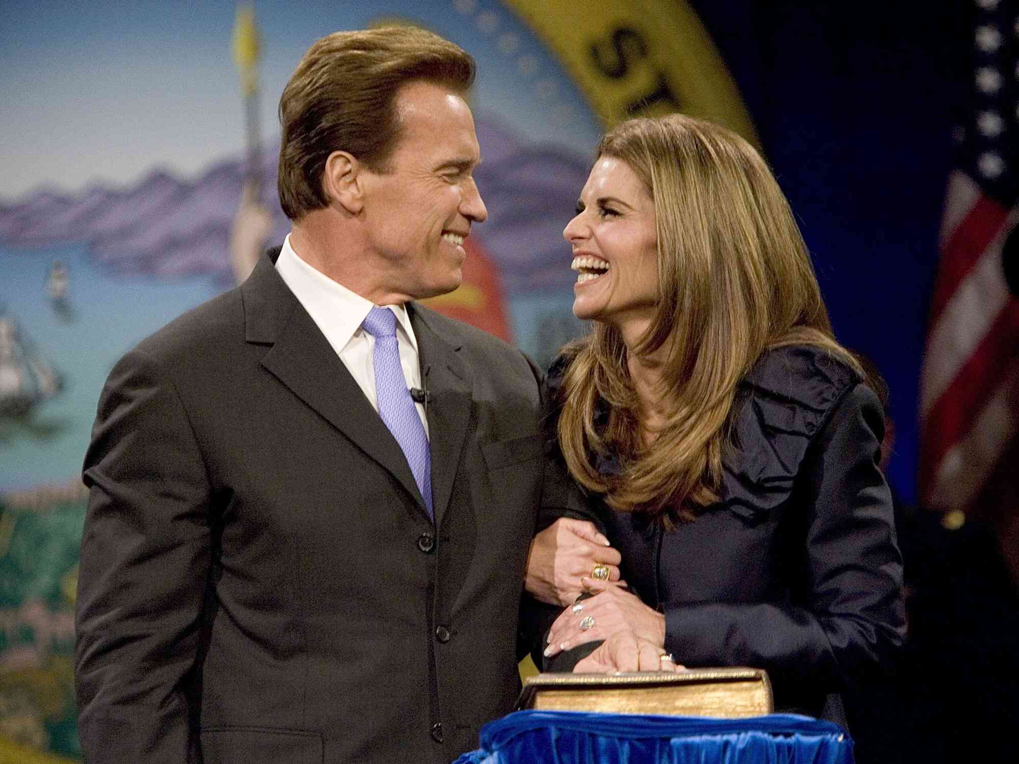 Arnold Schwarzenegger smiles at his wife Maria Shriver after being sworn into office for a second term as Governor on January 5, 2007 in Sacramento, California