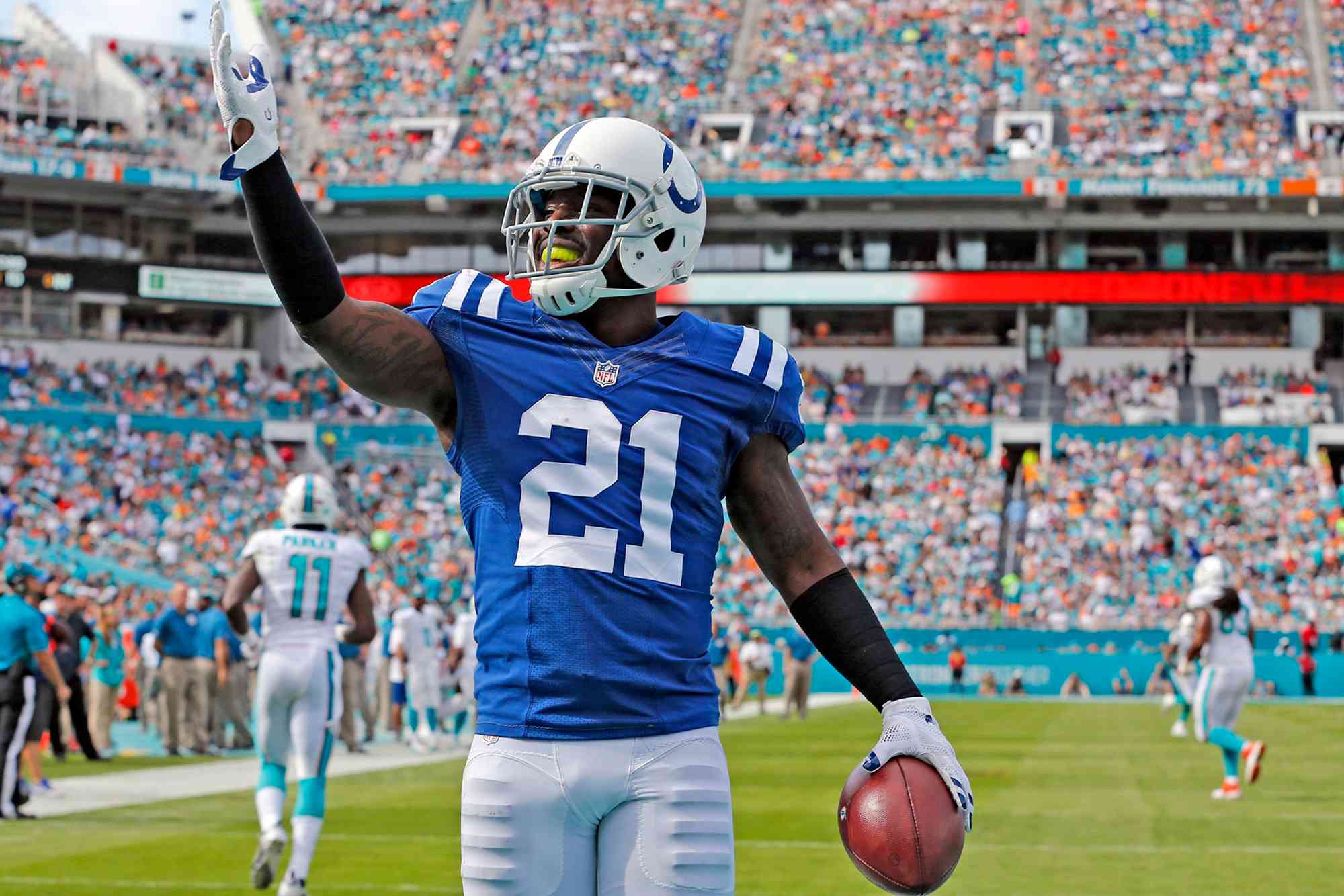 After intecepting Miami Dolphins quarterback Ryan Tennehill in the end zone, Indianapolis Colts' Vontae Davis celebrates during the first quarter on Sunday, Dec. 27, 2015, at Sun Life Stadium in Miami Gardens, Fla.