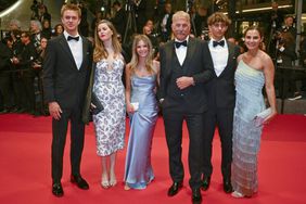 Kevin Costner poses with his children Cayden Wyatt Costner, Lily Costner, Grace Avery Costner, Hayes Costner and Annie Costner after the screening of the film Horizon: An American Saga at the 77th edition of the Cannes Film Festival in Cannes, southern France, on May 19, 2024. 