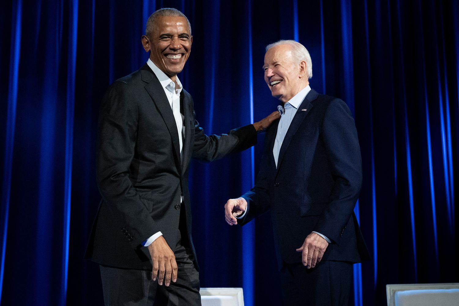 Former US President Barack Obama (L) and US President Joe Biden