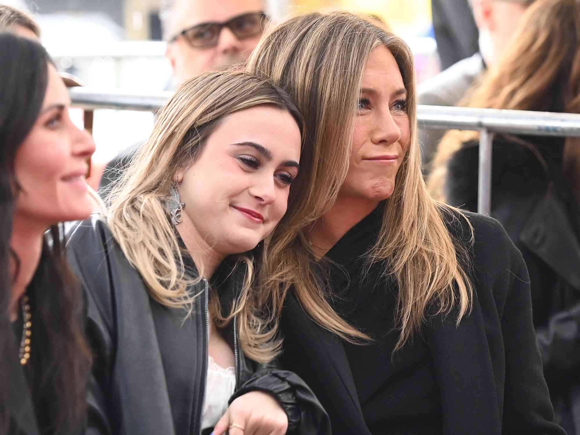 Coco Arquette and Jennifer Aniston at the star ceremony where Courteney Cox is honored with a star on the Hollywood Walk of Fame on February 27, 2023 in Los Angeles, California