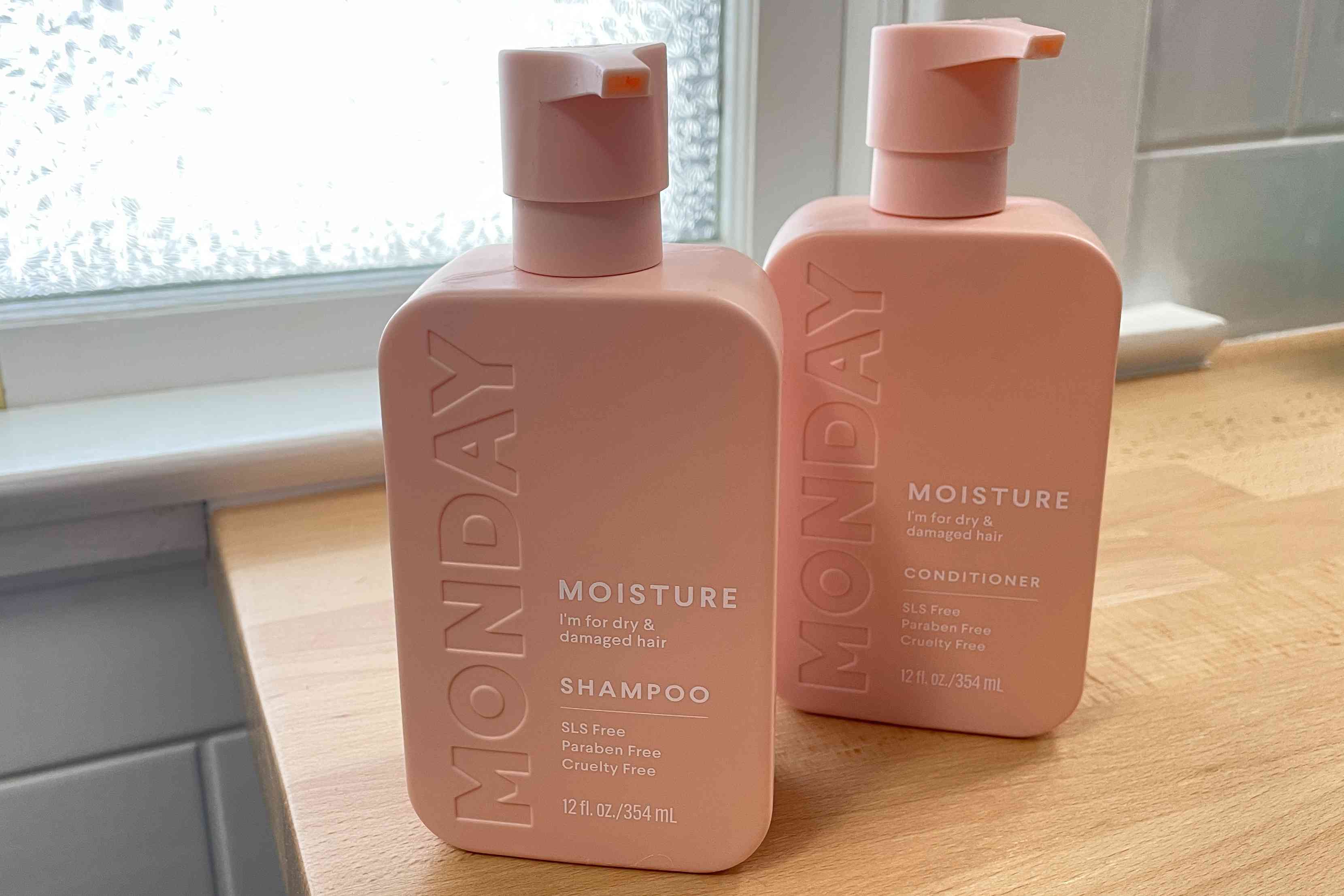 Bottles of MONDAY HAIRCARE Moisture Shampoo + Conditioner Set