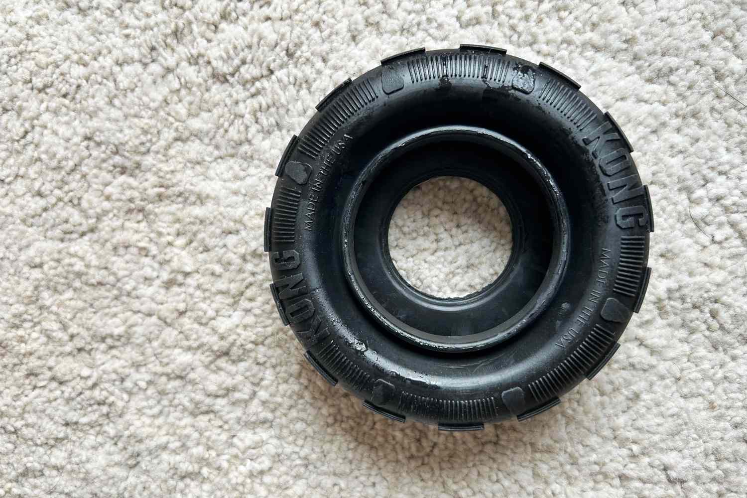 Kong Tire Dog Toy on carpet