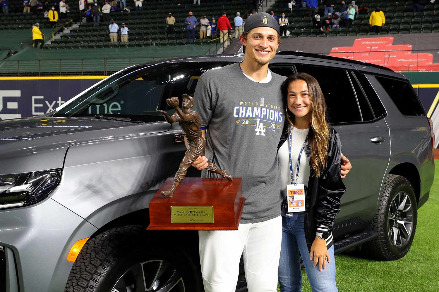 2020 Willie Mays World Series Most Valuable Player Corey Seager #5 of the Los Angeles Dodgers poses for a photo with his girlfriend Madisyn Van Ham after the Dodgers defeated the Tampa Bay Rays in Game 6 to clinch the 2020 World Series at Globe Life Field on Tuesday, October 27, 2020 in Arlington, Texas