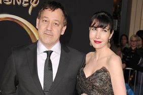 Sam Raimi and Gillian Greene arrives at the "OZ The Great And Powerful" Los Angeles Premiere at the El Capitan Theatre on February 13, 2013 