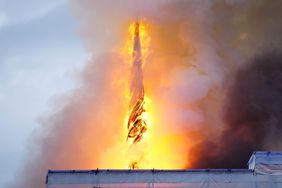 This photograph shows flames engulfing the Copenhagen's Stock Exchange building, in Copenhagen, on April 16, 2024.