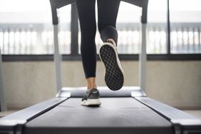 women legs running on treadmill