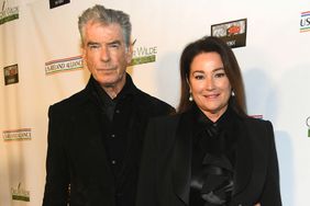 SANTA MONICA, CALIFORNIA - MARCH 07: (L-R) Pierce Brosnan and Keely Shaye Smith attend the US-Ireland Alliance's 18th annual Oscar Wilde Awards at Bad Robot on March 07, 2024 in Santa Monica, California.