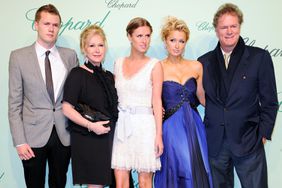 Rick Hilton, of the Hilton Hotel chain with his family (from left) son Barron, wife Kathy, daughters Nicky and Paris attending the Chopard 150th anniversary party at the Palm Beach hotel and casino, during the 63rd Cannes Film Festival