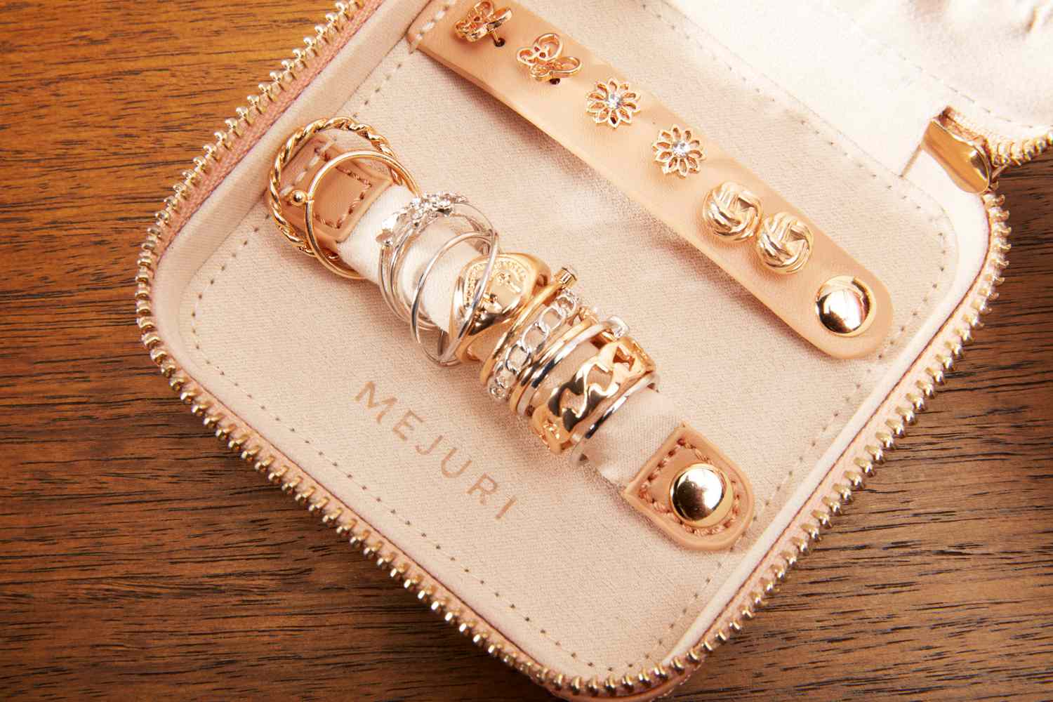 A close-up of the Mejuri Jewelry Case's ring and earring holder. 