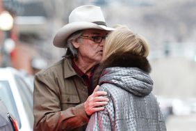 Goldie Hawn and Kurt Russell share a kiss before going shopping in Aspen, Colorado