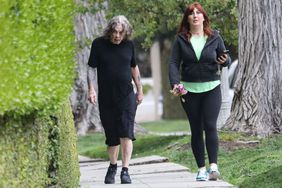 *EXCLUSIVE* Los Angeles, CA - *Web must call ** Legendary rocker Ozzy Osbourne may be 74 years old, but he's still going strong! Out for a leisurely walk with his caretaker in the bustling city of Los Angeles. Despite needing a caretaker to assist him on his walk, Ozzy's spirit and enthusiasm for life remain as strong as ever. As they walked, his caretaker paused to pick out some beautiful flowers and offered them to Ozzy for a sniff. Pictured: Ozzy Osbourne BACKGRID USA 13 APRIL 2023 USA: +1 310 798 9111 / usasales@backgrid.com UK: +44 208 344 2007 / uksales@backgrid.com *UK Clients - Pictures Containing Children Please Pixelate Face Prior To Publication*