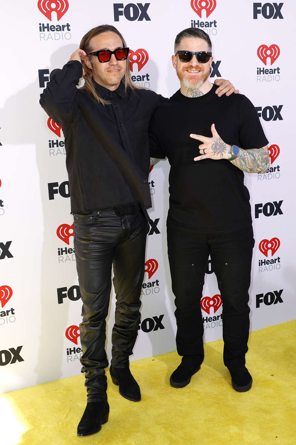 Pete Wentz and Andy Hurley of Fall Out Boy attend the 2024 iHeartRadio Music Awards at Dolby Theatre on April 01, 2024 in Hollywood, California