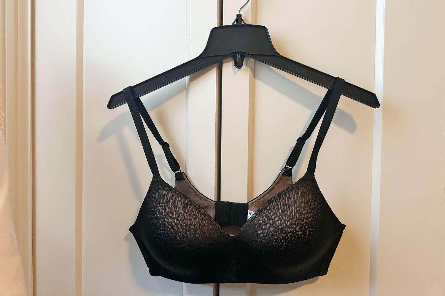 Wacoal Back Appeal Wire Free T-Shirt Bra hanging from a plastic hanging