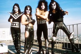 Kiss poses for a portrait session in January 1975