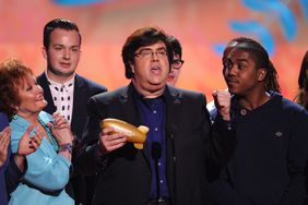 Writer/producer Dan Schneider accepts the Lifetime Achievement Award onstage during Nickelodeon's 27th Annual Kids' Choice Awards held at USC Galen Center on March 29, 2014 in Los Angeles, California