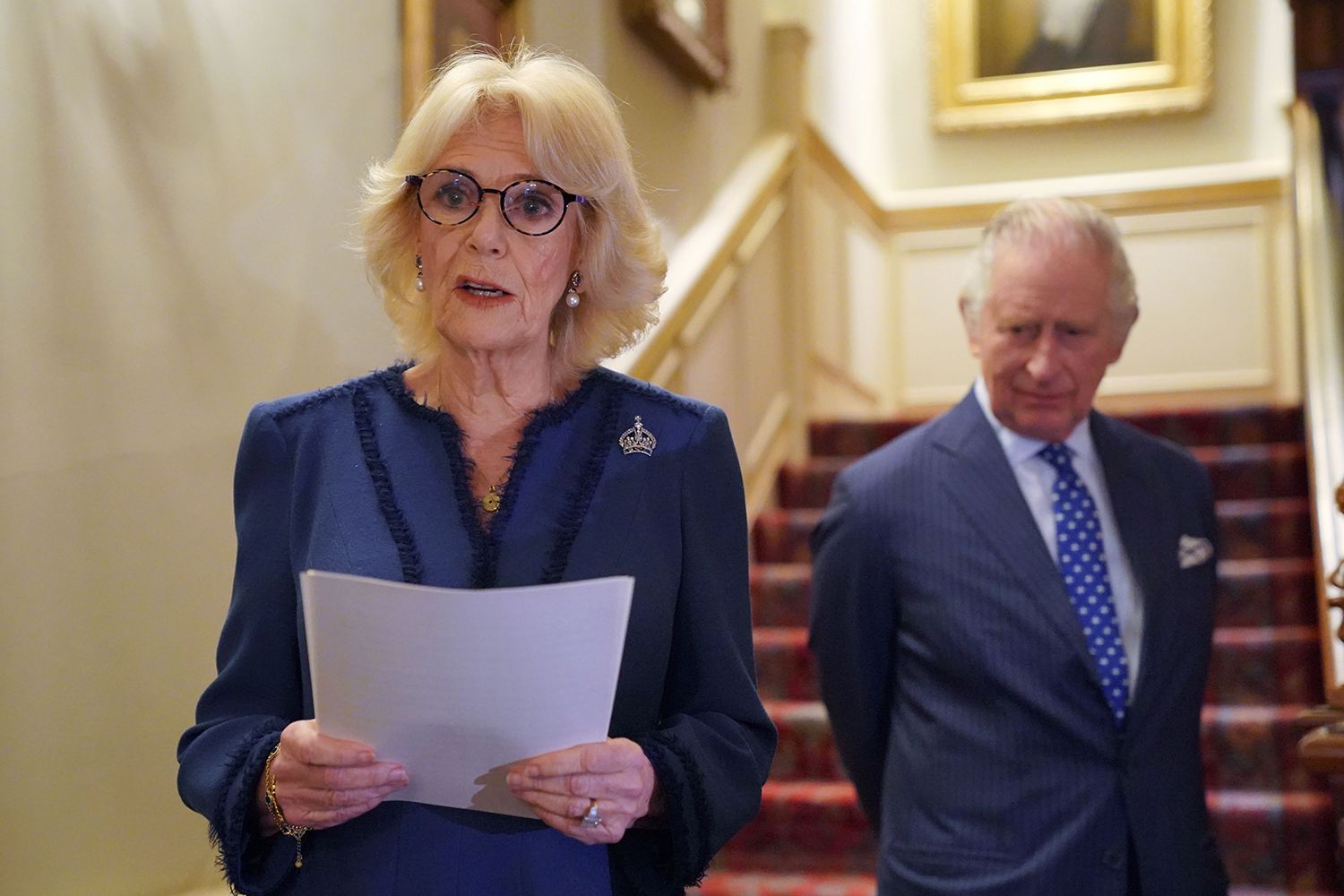 Camilla, Queen Consort, joined by King Charles III, speaks as she hosts a reception at Clarence House for authors, members of the literary community and representatives of literacy charities, to celebrate the second anniversary of The Reading Room on February 23, 2023 in London, England.