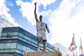 LOS ANGELES, CA - FEBRUARY 09: Fans gather outside of the Crypto.com Arena, formerly Staples Center, to celebrate the public unveiling of the new Kobe Bryant statue in honor of the basketball star who died in 2020 on February 09, 2024 in Los Angeles, California. 