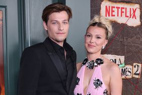 Jake Bongiovi and Millie Bobby Brown attend the Netflix Enola Holmes 2 Premiere 