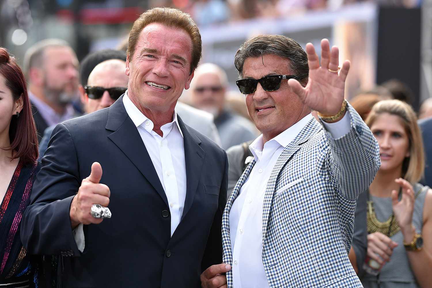 Actors Arnold Schwarzenegger and Sylvester Stallone arrive at the Los Angeles premiere of 'Terminator Genisys' at Dolby Theatre on June 28, 2015 in Hollywood, California.