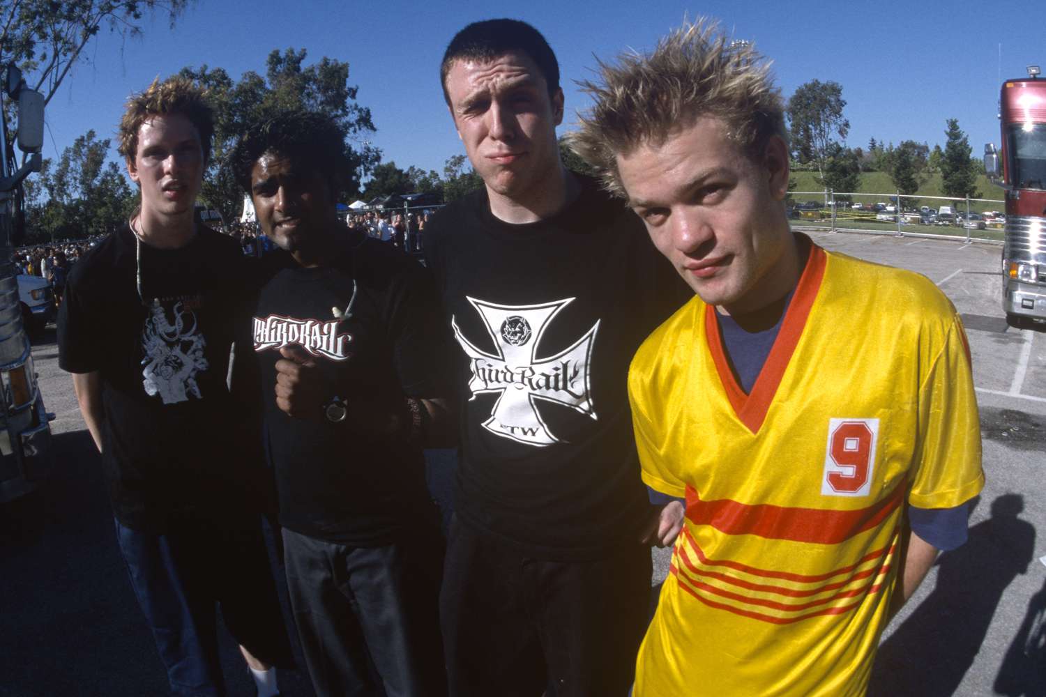 Deryck Whibley (R) and Sum 41 pose during Live 105's BFD at Shoreline Amphitheatre on June 15, 2001 in Mountain View, California.
