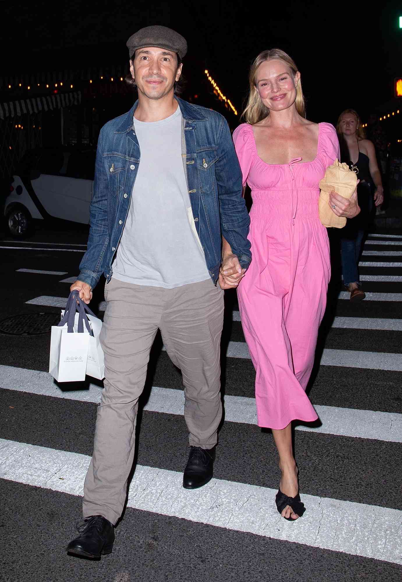 Kate Bosworth and Justin Long hold hands as they head to 7-Eleven after arriving at The Greenwich Hotel in New York City.