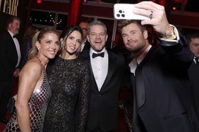 Elsa Pataky, Luciana Barroso, Matt Damon, and Chris Hemsworth attend the 2024 Vanity Fair Oscar Party Hosted By Radhika Jone