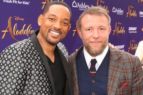 Will Smith (L) and Director Guy Ritchie attend the World Premiere of Disneys "Aladdin" at the El Capitan Theater in Hollywood CA on May 21, 2019