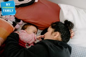 Liz Isaac holds her daughter, Alessandria, before bedtime in their room at Harvest Home in Los Angeles, California.