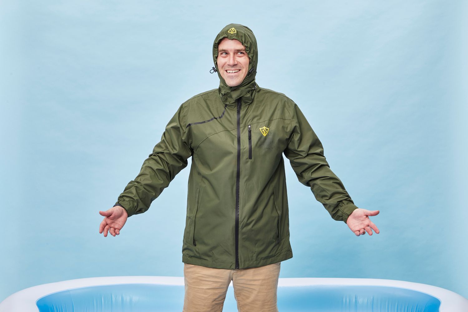 Man wearing a GIISAM Men's Windproof Waterproof Jacket