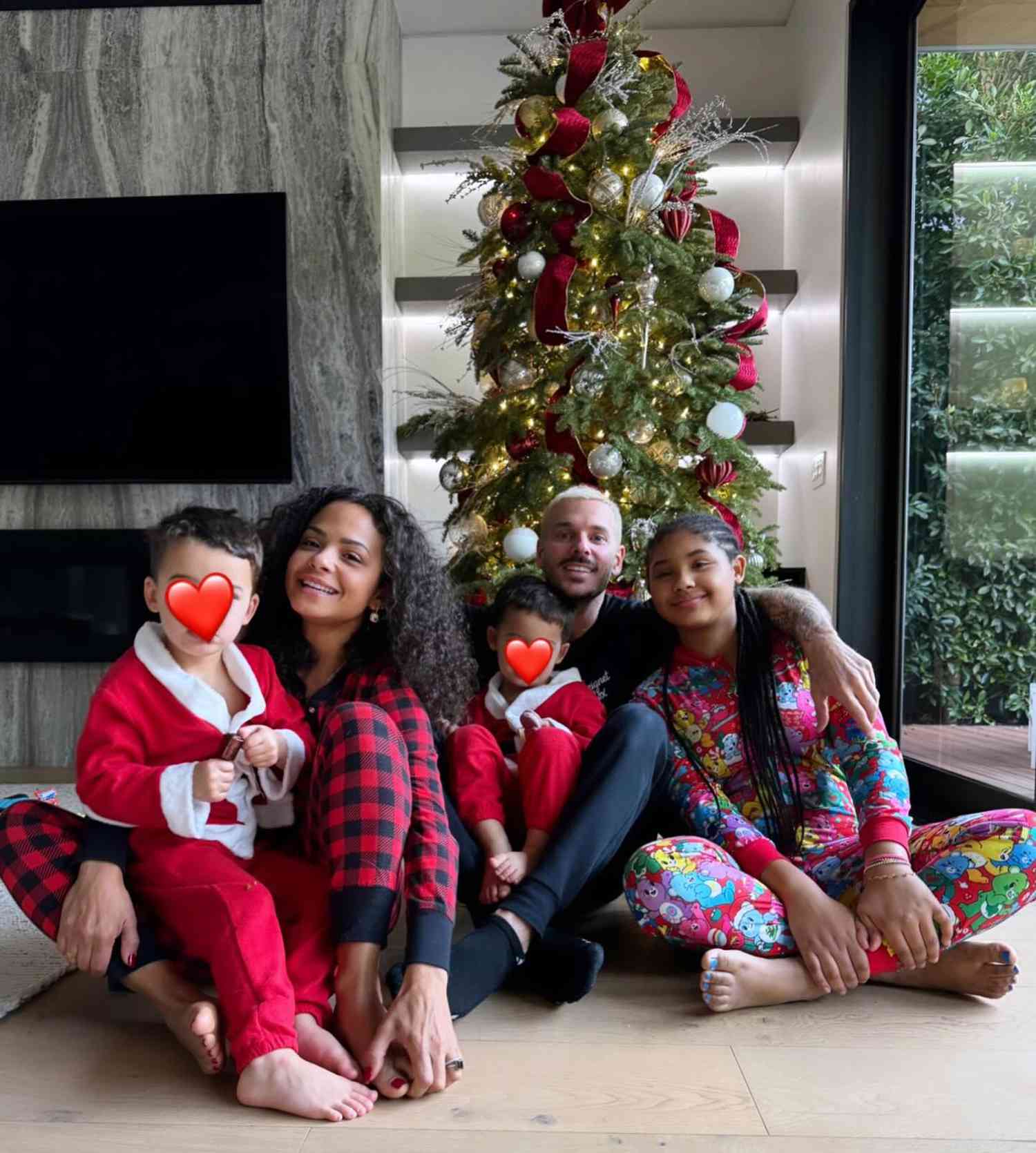 Christina Milian and Matt Pokora with kids Violet Madison, Isaiah, and Kenna. 
