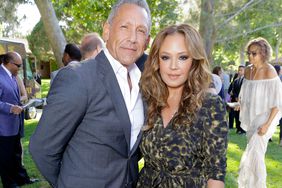 Angelo Pagan and Leah Remini attends the HollyRod 20th Annual DesignCare at Cross Creek Farm on July 14, 2018 in Malibu, California