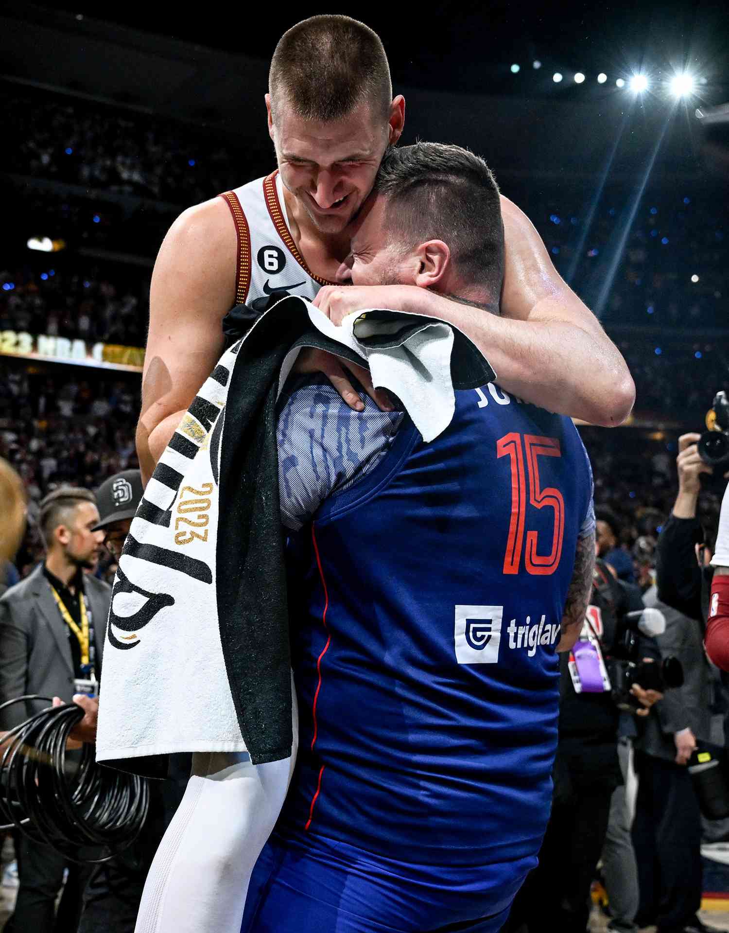 Nikola Jokic and his brother, Strahinja, after the fourth quarter of the Nuggets' 94-89 NBA Finals in 2023
