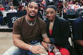 Simone Biles and Jonathan Owens attend a game between the Houston Rockets and the Los Angeles Lakers 