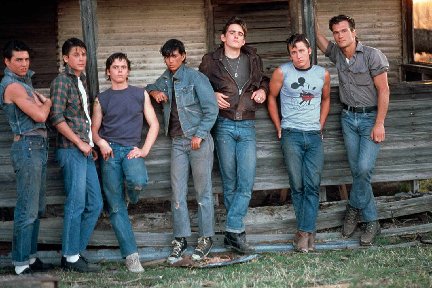 American actors Tom Cruise, Rob Lowe, C. Thomas Howell, Ralph Macchio, Matt Dillon, Emilio Estevez and Patrick Swayze on the set of The Outsiders, directed and produced by Francis Ford Coppola.