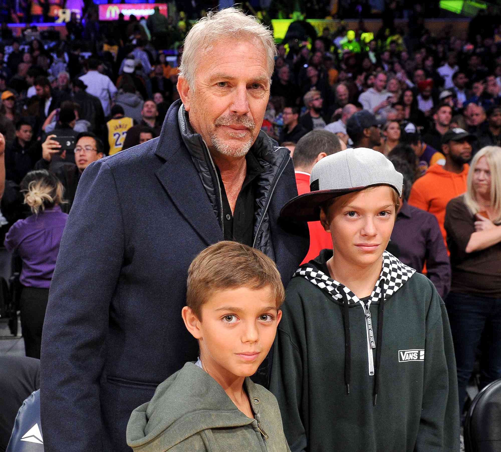 Kevin Costner, Hayes Logan Costner and Cayden Wyatt Costner attend a basketball game between the Los Angeles Lakers and the Miami Heat at Staples Center on December 10, 2018 in Los Angeles, California