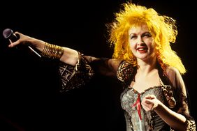 Cyndi Lauper performing at a WNEW Christmas Concert at Madison Square Garden in New York City on December 19, 1986. 