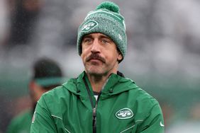 Aaron Rodgers #8 of the New York Jets looks on during warm ups prior to the game against the Atlanta Falcons at MetLife Stadium on December 03, 2023