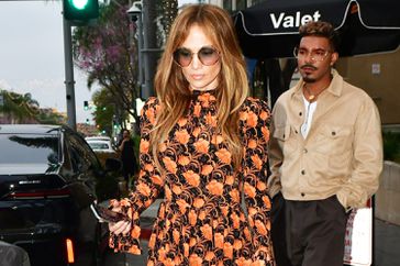 Superstar singer and actress Jennifer Lopez was spotted out in Beverly Hills for Mother's Day in a stunning floral dress. The world famous star met a couple of friends at "Wally's" restaurant.