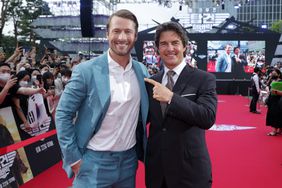  Tom Cruise and Glen Powell attends the Korea Red Carpet for Top Gun: Maverick at Lotte World on June 19, 2022 in Seoul, South Korea. 