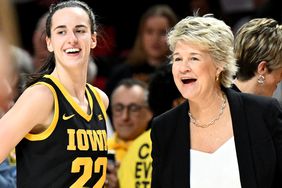 Caitlin Clark #22 of the Iowa Hawkeyes celebrates with head coach Lisa Bluder after coming out of the game in the fourth quarter against the Maryland Terrapins at Xfinity Center on February 03, 2024 in College Park, Maryland. 