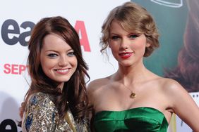Emma Stone and singer Taylor Swift arrive at the Los Angeles Premiere "Easy A"