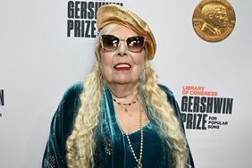 Joni Mitchell poses on the red carpet at the 2023 Library of Congress Gershwin Prize for American Song