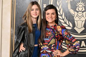 Harper Renn and Tiffani Thiessen attend "The Hunger Games: The Ballad Of Songbirds & Snakes" Los Angeles Premiere at TCL Chinese Theatre on November 13, 2023 