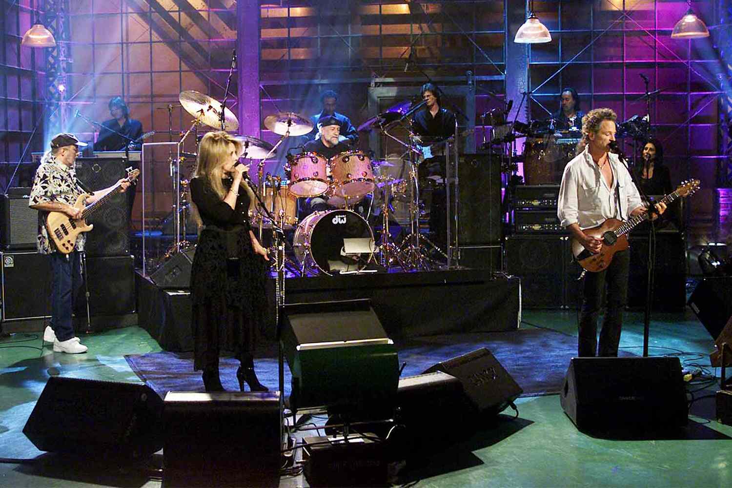 Musical guests John McVie, Stevie Nicks, Mick Fleetwood (back), and Lindsey Buckingham of Fleetwood Mac performs on April 23, 2003